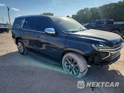 Czwarte zdjęcie samochodu z boku: 2021 CHEVROLET TAHOE K1500 PREMIER VIN:1GNSKSKD9MR125456 - miniatura