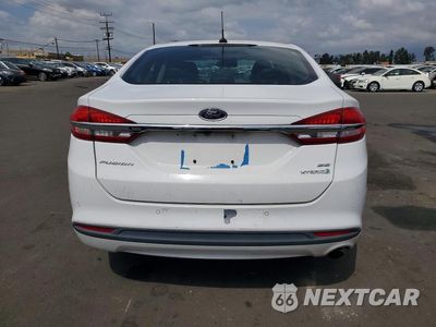Zdjęcie 6 z 12 samochodu: 2018 FORD FUSION SE HYBRID VIN:3FA6P0LU0JR172105 - miniatura