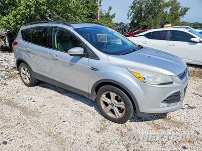 Czwarte zdjęcie samochodu z boku: 2015 FORD ESCAPE SE VIN:1FMCU9GX1FUB10478 - miniatura