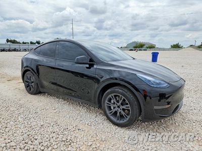 Czwarte zdjęcie samochodu z boku: 2024 TESLA MODEL Y VIN:7SAYGDED9RA303634 - miniatura