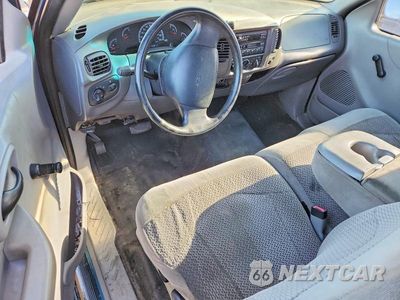Zdjęcie 8 z 12 samochodu: 2000 FORD F150 XL VIN:1FTZX1722YNA71358 - miniatura