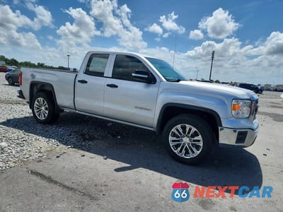 Czwarte zdjęcie samochodu z boku: 2015 GMC SIERRA K1500 VIN:1GTV2TEC4FZ186358 - miniatura