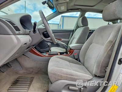 Zdjęcie 7 z 12 samochodu: 2002 TOYOTA CAMRY XLE VIN:4T1BE30K22U077912 - miniatura