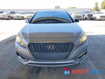 Piąte zdjęcie samochodu w środku: 2016 HYUNDAI SONATA HYBRID LIMITED VIN:KMHE34L19GA022216 - miniatura