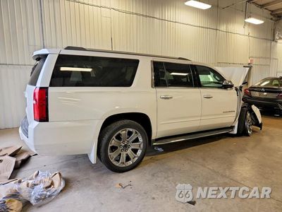 Trzecie zdjęcie samochodu z tyłu: 2018 CHEVROLET SUBURBAN K1500 PREMIER VIN:1GNSKJKCXJR178826 - miniatura
