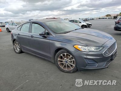 Czwarte zdjęcie samochodu z boku: 2019 FORD FUSION SE VIN:3FA6P0HD5KR115618 - miniatura
