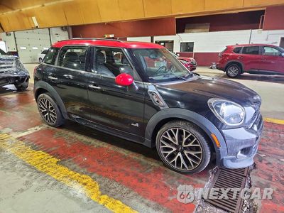 Czwarte zdjęcie samochodu z boku: 2013 MINI COOPER COUNTRYMAN JCW VIN:WMWXD1C51DWM28658 - miniatura