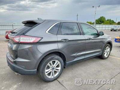 Trzecie zdjęcie samochodu z tyłu: 2015 FORD EDGE SEL VIN:2FMTK4J82FBC21122 - miniatura