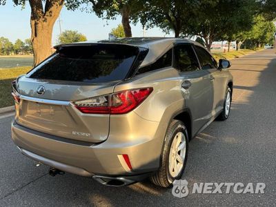 Czwarte zdjęcie samochodu z boku: 2017 LEXUS RX 350 BASE VIN:2T2BZMCA1HC091934 - miniatura