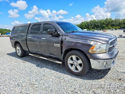 Czwarte zdjęcie samochodu z boku: 2015 RAM 1500 SLT VIN:1C6RR7TM2FS724376 - miniatura
