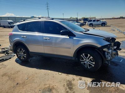 Czwarte zdjęcie samochodu z boku: 2018 TOYOTA RAV4 LE VIN:JTMBFREV1JJ202860 - miniatura