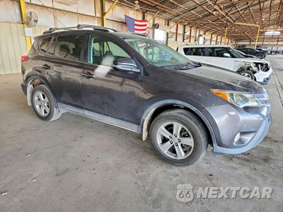 Czwarte zdjęcie samochodu z boku: 2014 TOYOTA RAV4 XLE VIN:2T3WFREV4EW102941 - miniatura