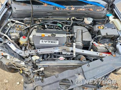 Zdjęcie 12 z 14 samochodu: 2006 HONDA CR-V SE VIN:JHLRD78906C000551 - miniatura