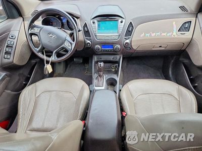 Zdjęcie 8 z 13 samochodu: 2014 HYUNDAI TUCSON LIMITED VIN:KM8JUCAG9EU844121 - miniatura