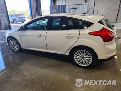 Drugie zdjęcie samochodu z przodu: 2014 FORD FOCUS TITANIUM VIN:1FADP3N21EL395620 - miniatura