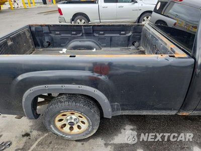 Zdjęcie 10 z 12 samochodu: 2011 GMC SIERRA K1500 VIN:1GTN2TEX6BZ349797 - miniatura