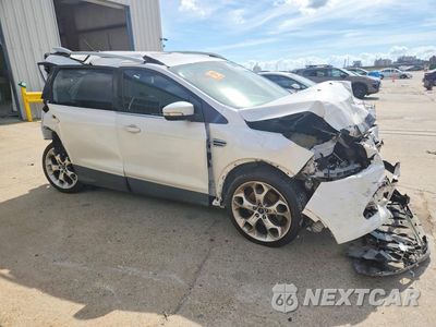 Czwarte zdjęcie samochodu z boku: 2015 FORD ESCAPE TITANIUM VIN:1FMCU9J98FUC22012 - miniatura