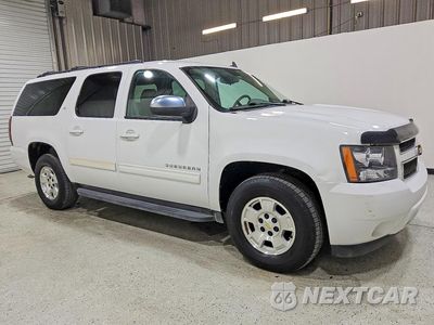 Czwarte zdjęcie samochodu z boku: 2012 CHEVROLET SUBURBAN C1500 LT VIN:1GNSCJE09CR127772 - miniatura