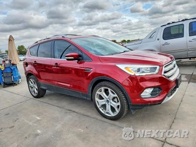 Czwarte zdjęcie samochodu z boku: 2018 FORD ESCAPE TITANIUM VIN:1FMCU0J98JUA22042 - miniatura