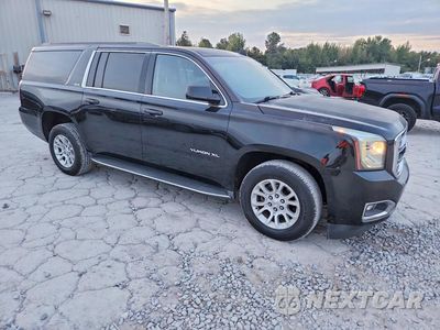 Czwarte zdjęcie samochodu z boku: 2016 GMC YUKON XL C1500 SLE VIN:1GKS1FKCXGR474449 - miniatura