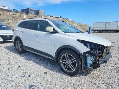 Czwarte zdjęcie samochodu z boku: 2017 HYUNDAI SANTA FE LIMITED ULTIMATE VIN:KM8SRDHF9HU248052 - miniatura