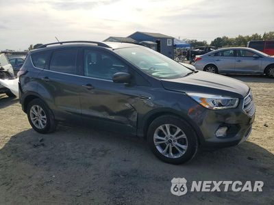 Czwarte zdjęcie samochodu z boku: 2018 FORD ESCAPE SEL VIN:1FMCU9HD8JUB07347 - miniatura