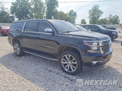 Czwarte zdjęcie samochodu z boku: 2017 CHEVROLET SUBURBAN K1500 PREMIER VIN:1GNSKJKCXHR347768 - miniatura