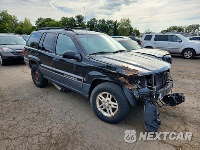 Czwarte zdjęcie samochodu z boku: 2004 JEEP GRAND CHEROKEE LAREDO VIN:1J4GW48S44C189051 - miniatura