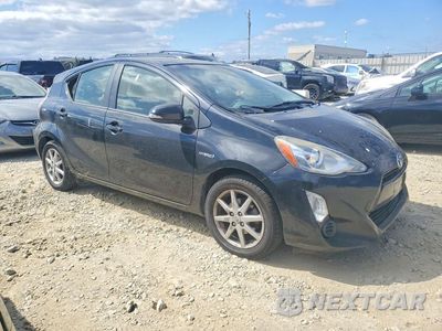 Czwarte zdjęcie samochodu z boku: 2015 TOYOTA PRIUS C THREE VIN:JTDKDTB38F1097795 - miniatura