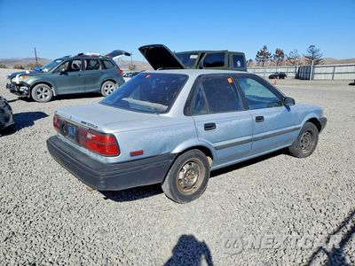 Trzecie zdjęcie samochodu z tyłu: 1991 TOYOTA COROLLA DELUXE VIN:1NXAE94A8MZ230683 - miniatura