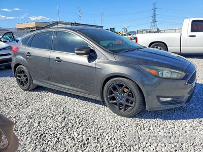 Czwarte zdjęcie samochodu z boku: 2016 FORD FOCUS SE VIN:1FADP3K21GL311755 - miniatura