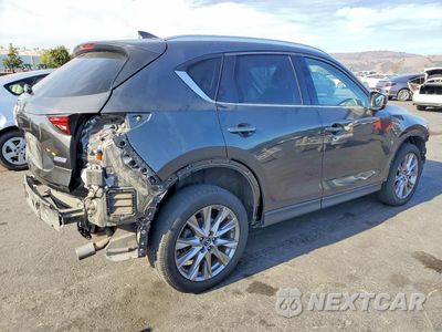 Trzecie zdjęcie samochodu z tyłu: 2019 MAZDA CX-5 GRAND TOURING VIN:JM3KFADM8K0673509 - miniatura