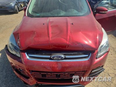 Zdjęcie 11 z 12 samochodu: 2016 FORD ESCAPE TITANIUM VIN:1FMCU9J91GUB32427 - miniatura