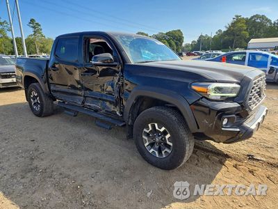 Czwarte zdjęcie samochodu z boku: 2023 TOYOTA TACOMA TRD OFF-ROAD VIN:3TMCZ5AN4PM579043 - miniatura
