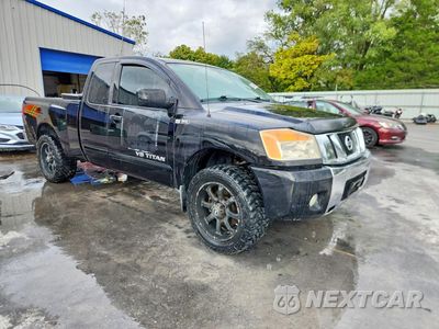 Czwarte zdjęcie samochodu z boku: 2011 NISSAN TITAN SV VIN:1N6BA0CAXBN313103 - miniatura