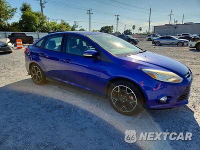 Czwarte zdjęcie samochodu z boku: 2014 FORD FOCUS SE VIN:1FADP3F22EL165907 - miniatura
