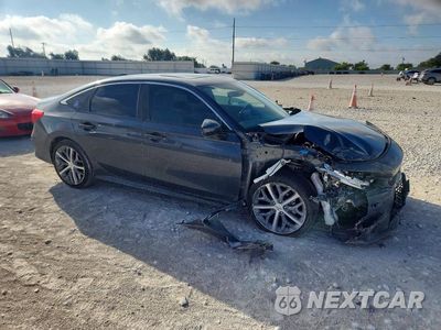 Czwarte zdjęcie samochodu z boku: 2024 HONDA CIVIC TOURING VIN:2HGFE1F91RH305296 - miniatura