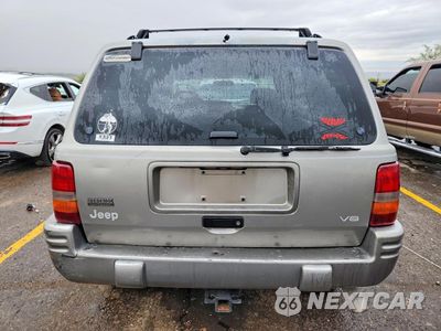Zdjęcie 6 z 14 samochodu: 1997 JEEP GRAND CHEROKEE LIMITED VIN:1J4GZ78Y2VC614815 - miniatura