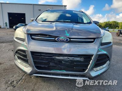 Piąte zdjęcie samochodu w środku: 2014 FORD ESCAPE TITANIUM VIN:1FMCU0J99EUB23161 - miniatura