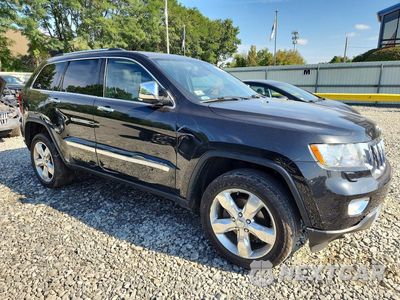 Czwarte zdjęcie samochodu z boku: 2013 JEEP GRAND CHEROKEE OVERLAND VIN:1C4RJFCG9DC566629 - miniatura