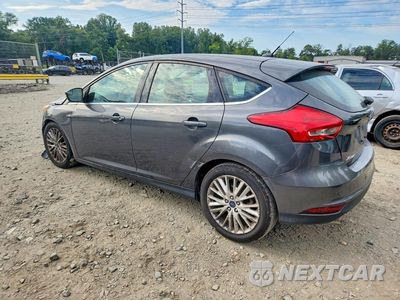 Drugie zdjęcie samochodu z przodu: 2016 FORD FOCUS TITANIUM VIN:1FADP3N25GL400756 - miniatura