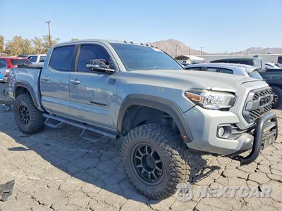 Czwarte zdjęcie samochodu z boku: 2020 TOYOTA TACOMA TRD OFF-ROAD VIN:3TMAZ5CN7LM133581 - miniatura