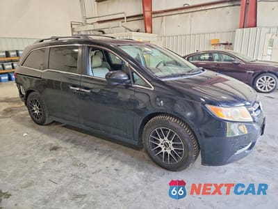Czwarte zdjęcie samochodu z boku: 2014 HONDA ODYSSEY EX VIN:5FNRL5H4XEB002768 - miniatura