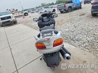 Czwarte zdjęcie samochodu z boku: 2004 SUZUKI AN650 K3 VIN:JS1CP51A342100675 - miniatura