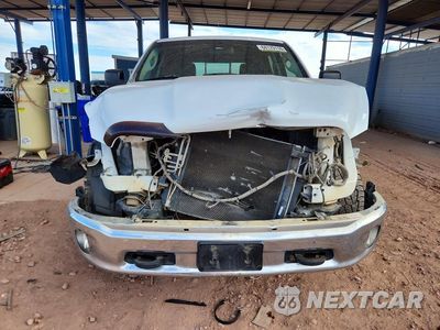 Piąte zdjęcie samochodu w środku: 2014 RAM 1500 SLT VIN:1C6RR7TT3ES431625 - miniatura