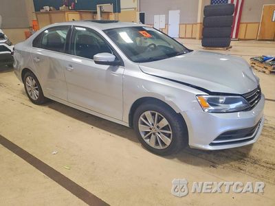 Czwarte zdjęcie samochodu z boku: 2016 VOLKSWAGEN JETTA SE VIN:3VWD67AJ2GM343316 - miniatura