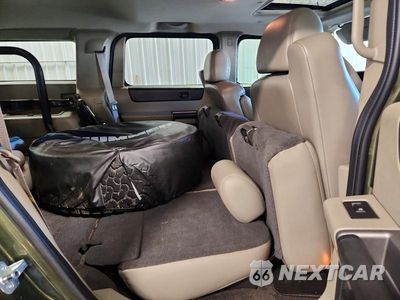 Zdjęcie 11 z 14 samochodu: 2004 HUMMER H2 VIN:5GRGN23U34H110279 - miniatura