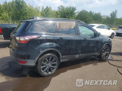 Trzecie zdjęcie samochodu z tyłu: 2018 FORD ESCAPE SE VIN:1FMCU9GD8JUD49072 - miniatura
