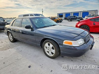 Czwarte zdjęcie samochodu z boku: 2004 FORD CROWN VICTORIA LX VIN:2FAHP74W44X180912 - miniatura