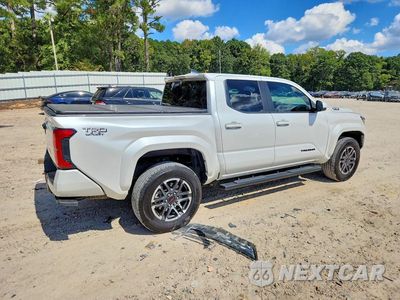 Trzecie zdjęcie samochodu z tyłu: 2024 TOYOTA TACOMA TRD SPORT HV VIN:3TYLC5LN0RT007800 - miniatura